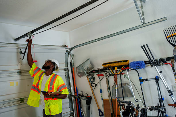 Professional Garage Door Installation technician working in Springfield, SD